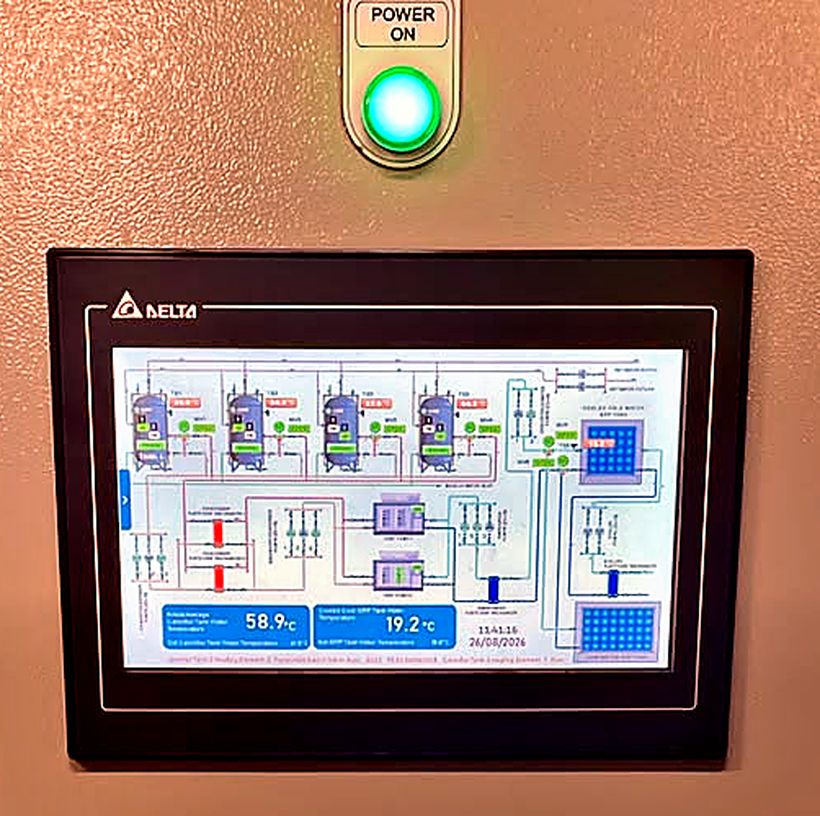 PLC control panel — hot water system running