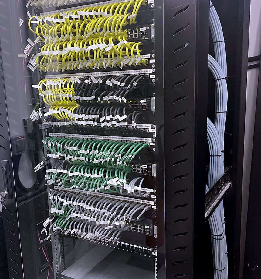 Data cabinet — colour-coded, labelled patching